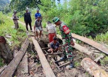 Perbaikan jembatan darurat di jalan lingkar kesui